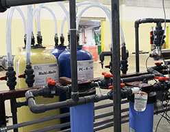 A closed loop water reuse system at a recycled and renovated heavy duty truck parts manufacturing facility in a state with water shortage.